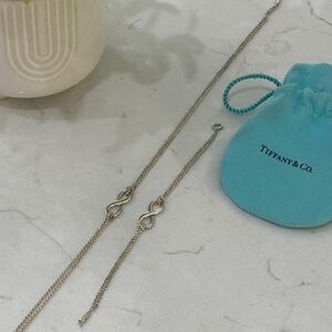 Tiffany & Co. Silver infinity Jewelry with Blue Pouch